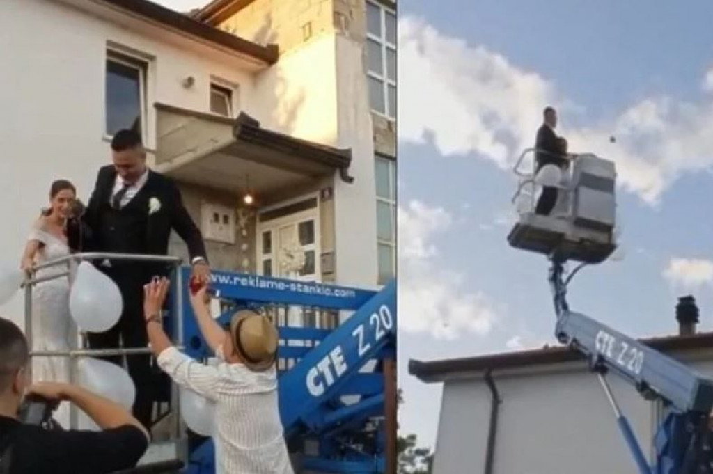 Mladenci iz Gruda angažirali dizalicu da prebace jabuku