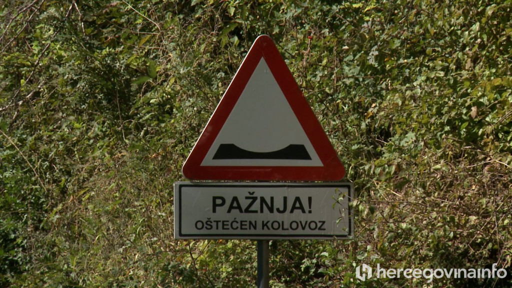 Cesta, oštećena cesta znak